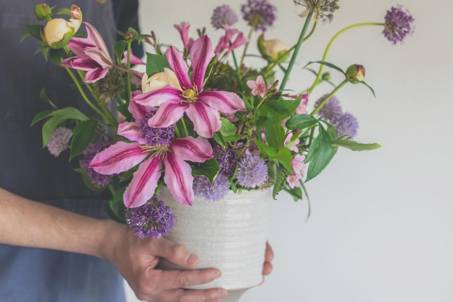 Modern office interior showcasing thoughtful floral design integration